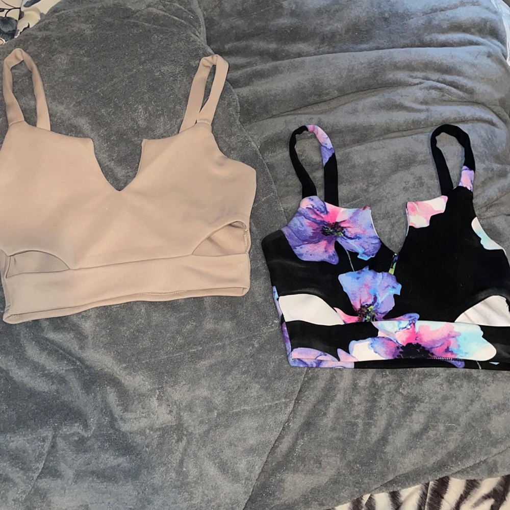 Two crop tops with slits in the front